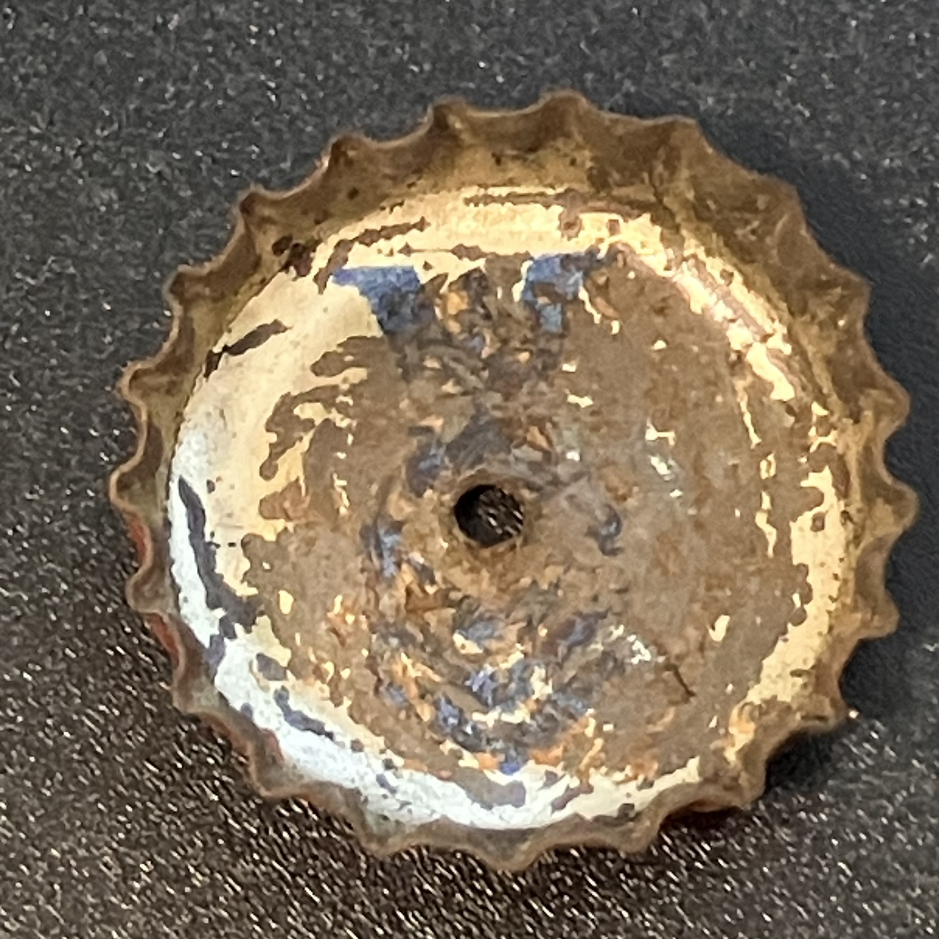 crown-cap liner of unadvertised variant