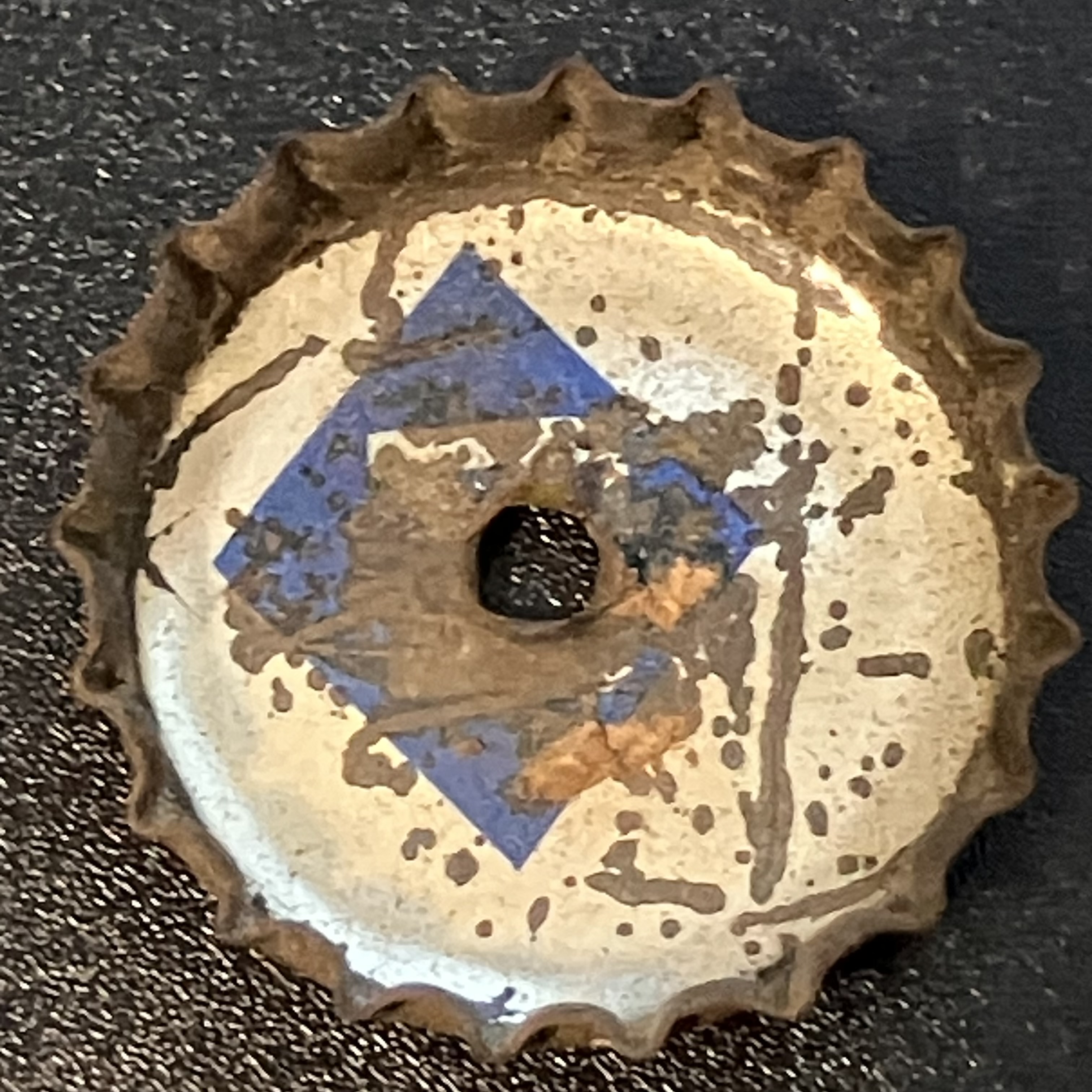 crown-cap liner of unadvertised variant