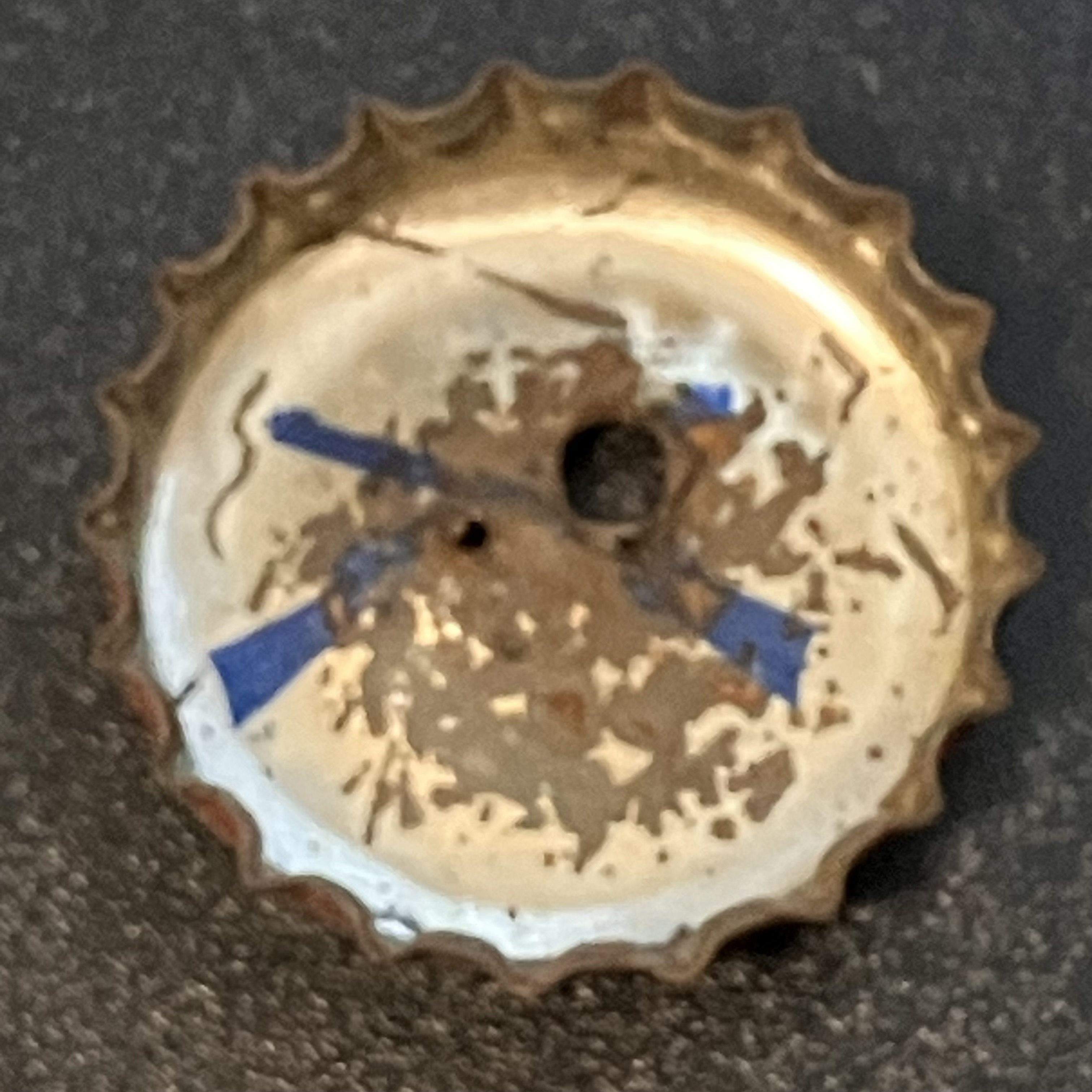 crown-cap liner of unadvertised variant