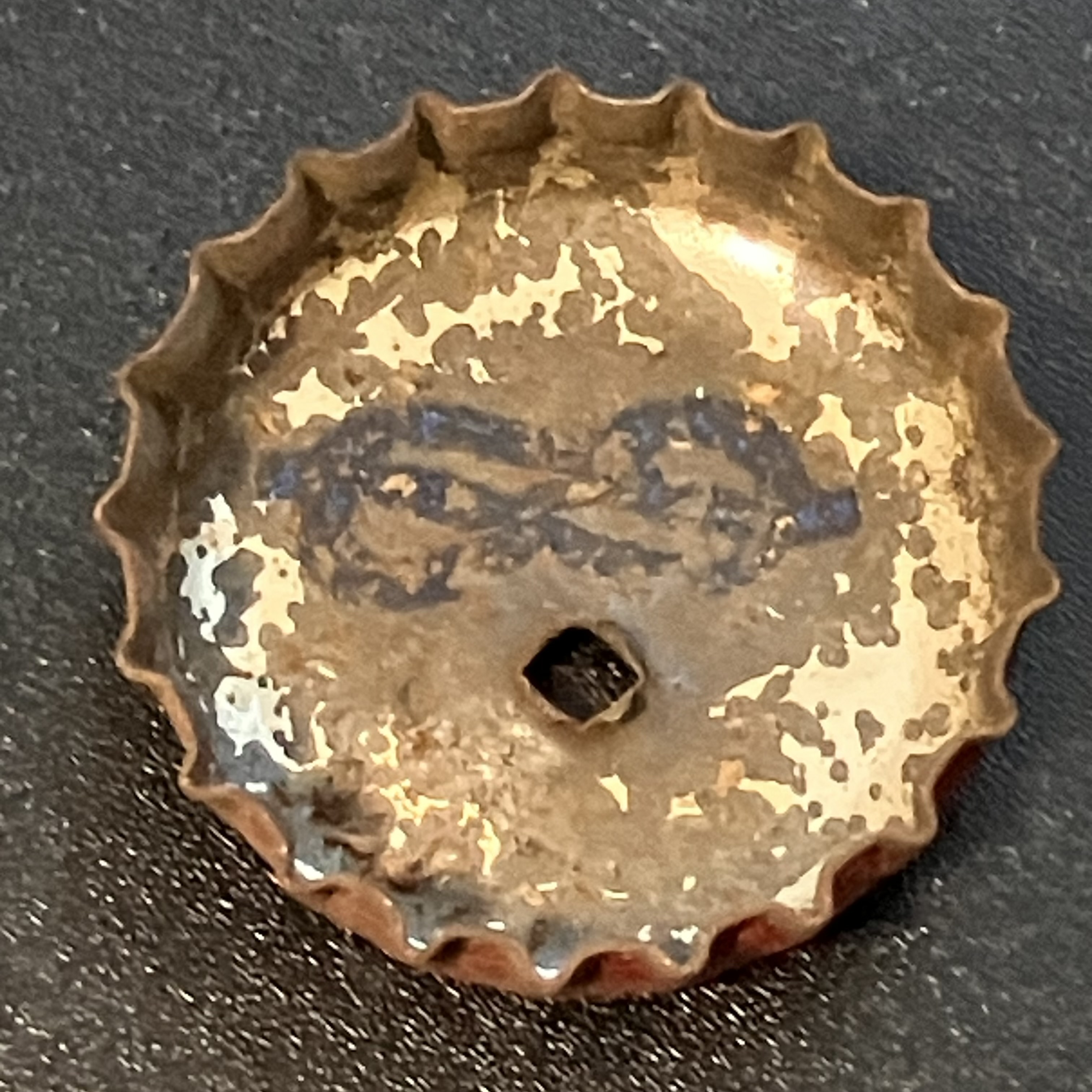 crown-cap liner of unadvertised variant
