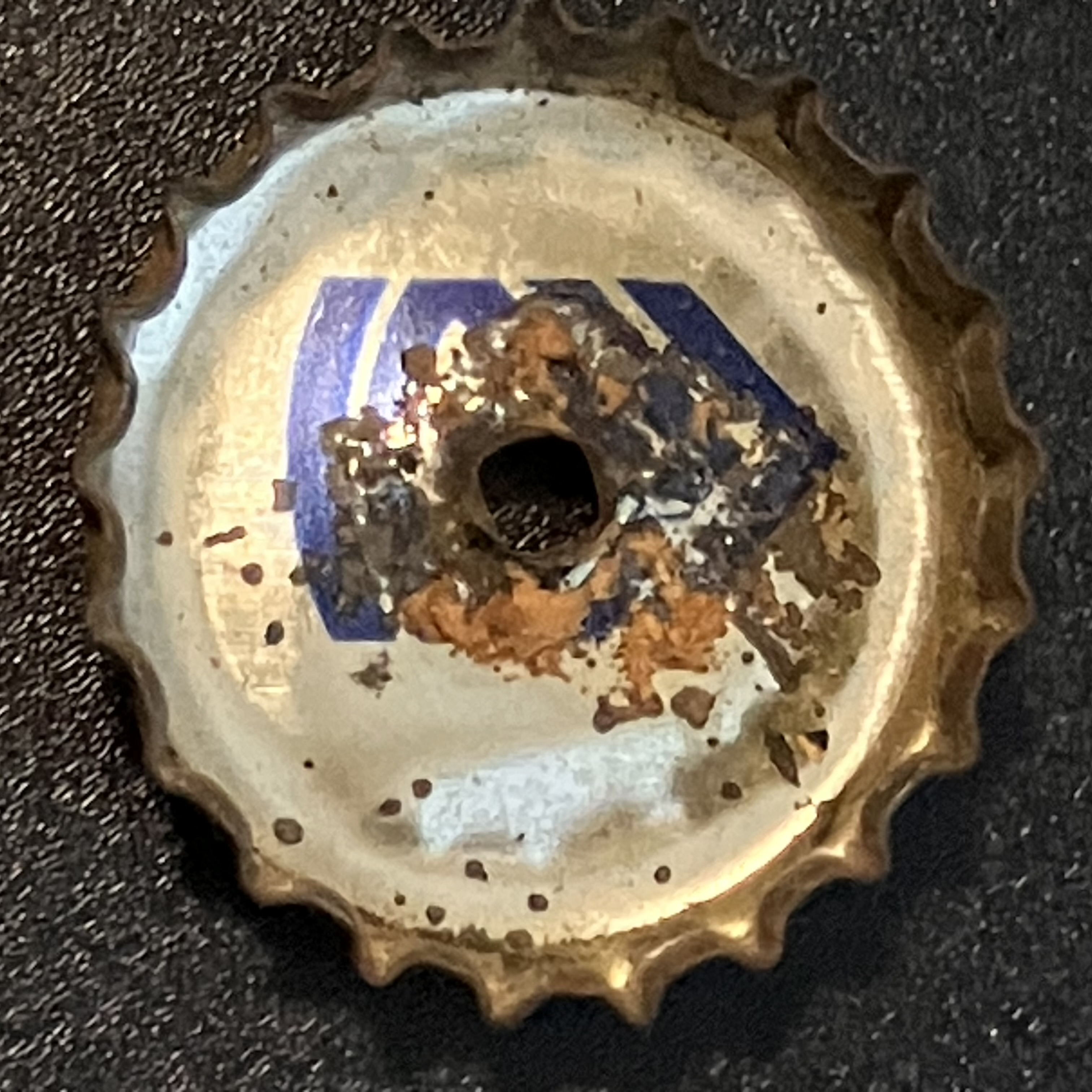 crown-cap liner of unadvertised variant