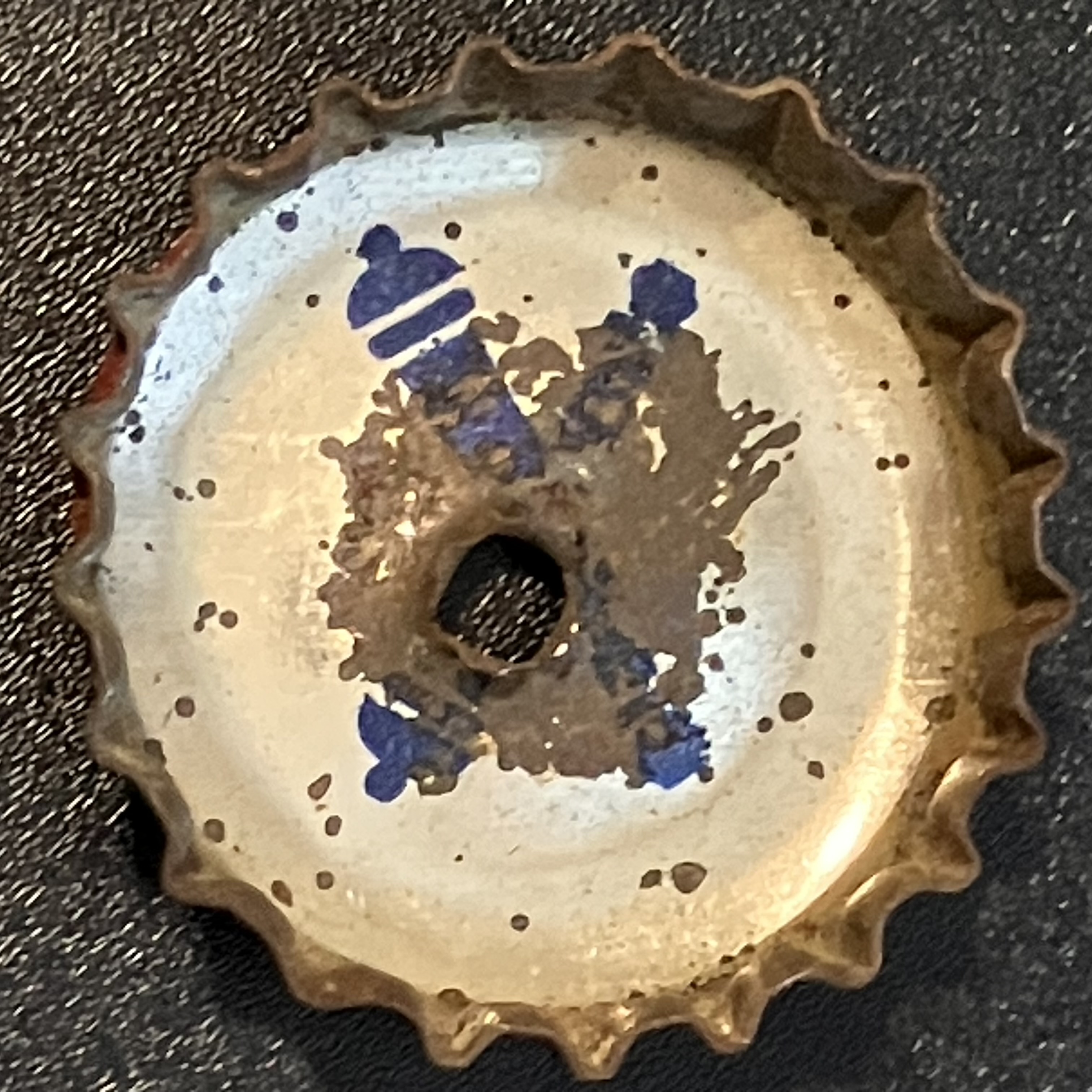 crown-cap liner of unadvertised variant