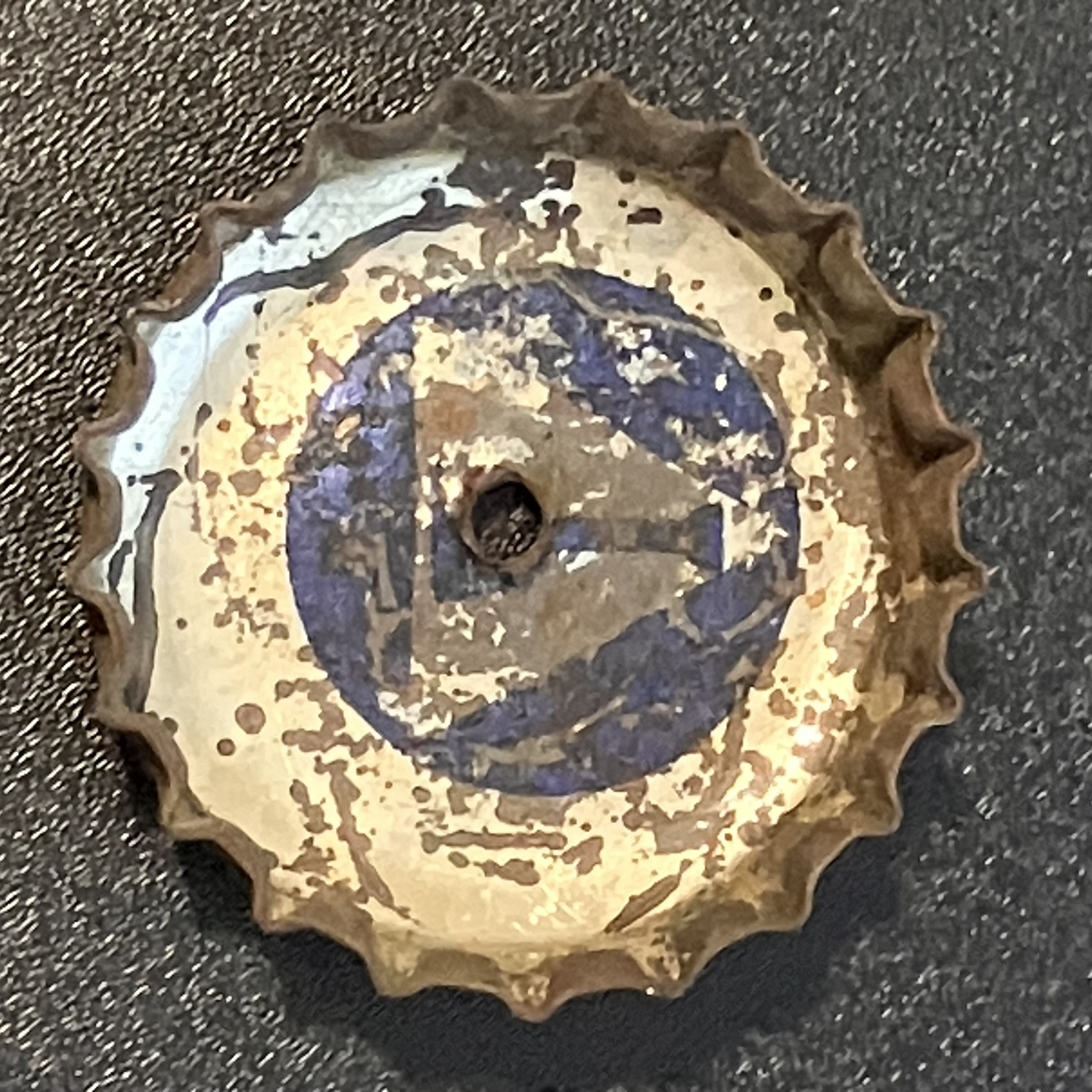 crown-cap liner of unadvertised variant