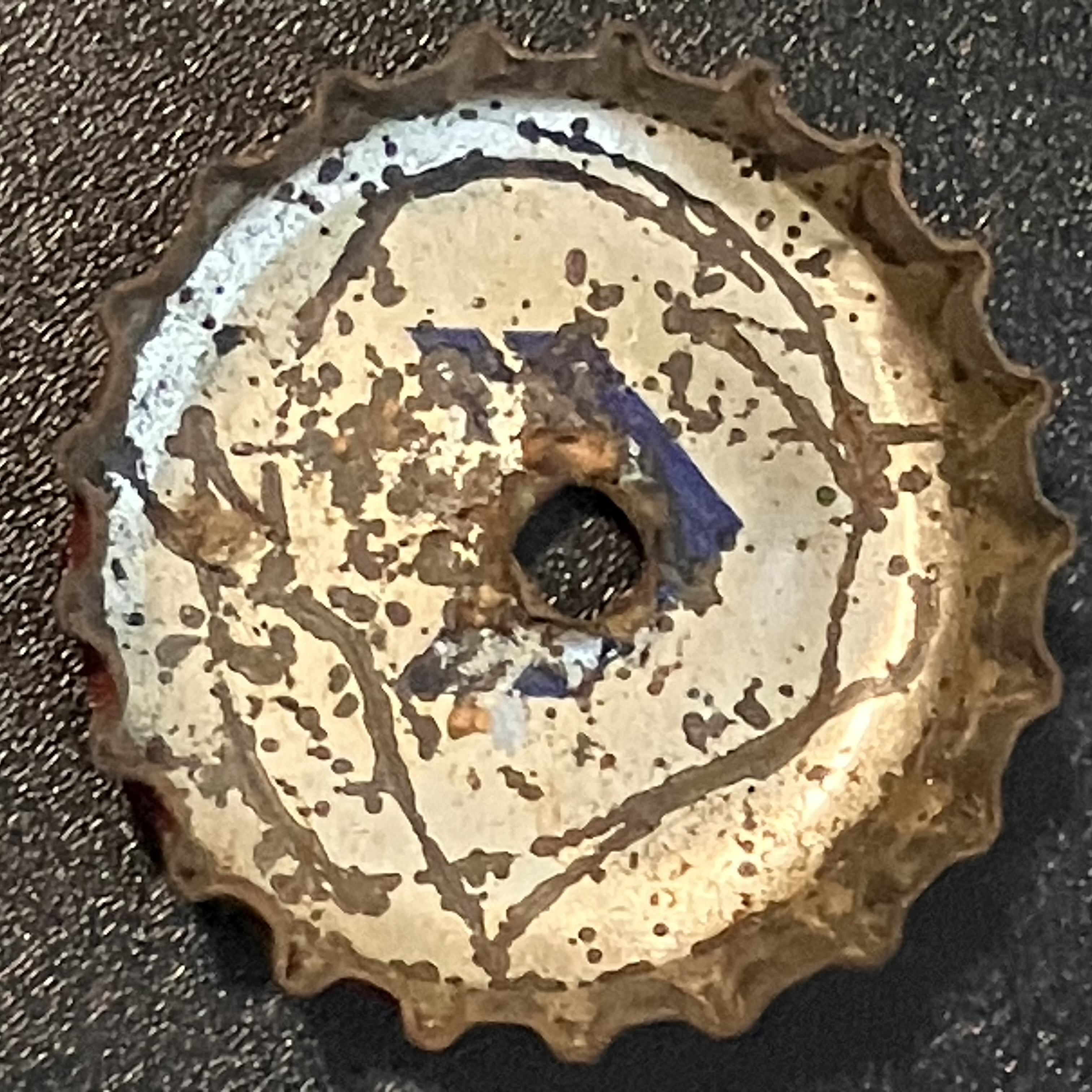 crown-cap liner of unadvertised variant